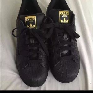 Adidas cute 7.5 men’s  gold and black new $120